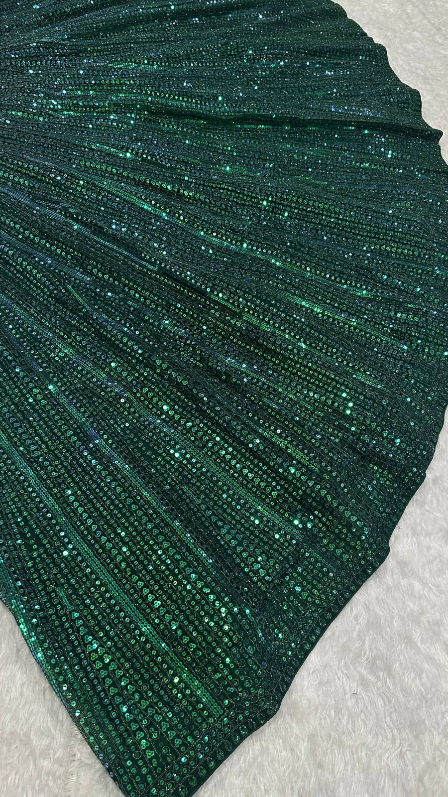 Thumbnail: emerald green lehenga set with all-over sequin and crystal embroidery. 