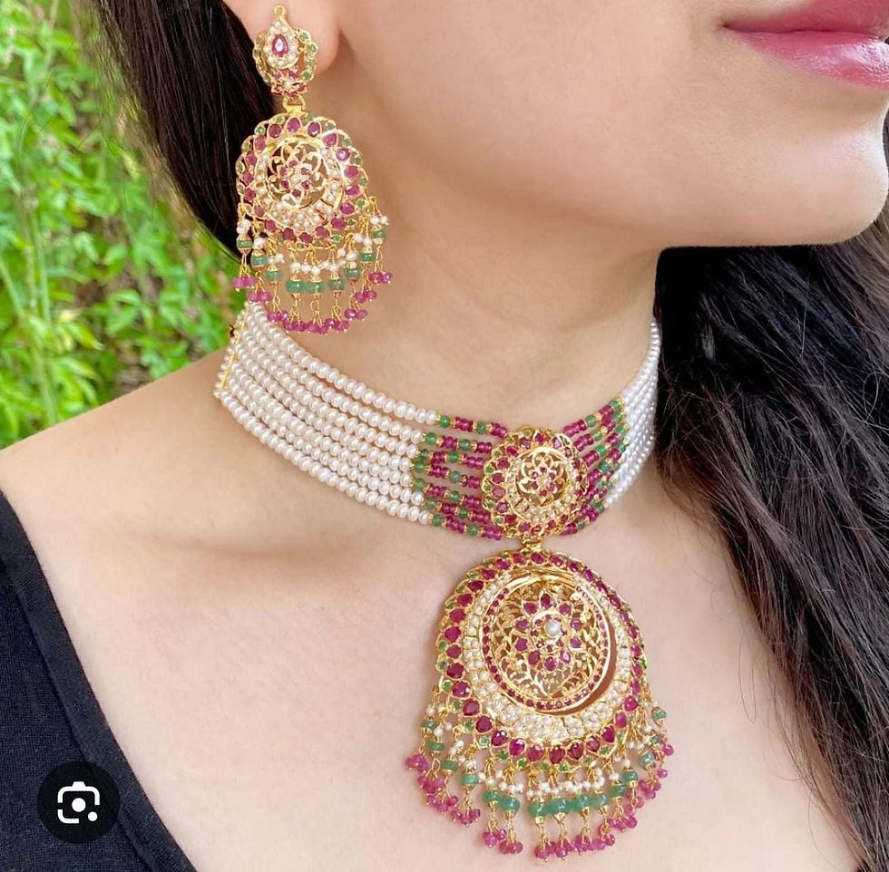 Thumbnail: gold-plated jadau choker necklace set featuring pearls, rubies, and emeralds. 
