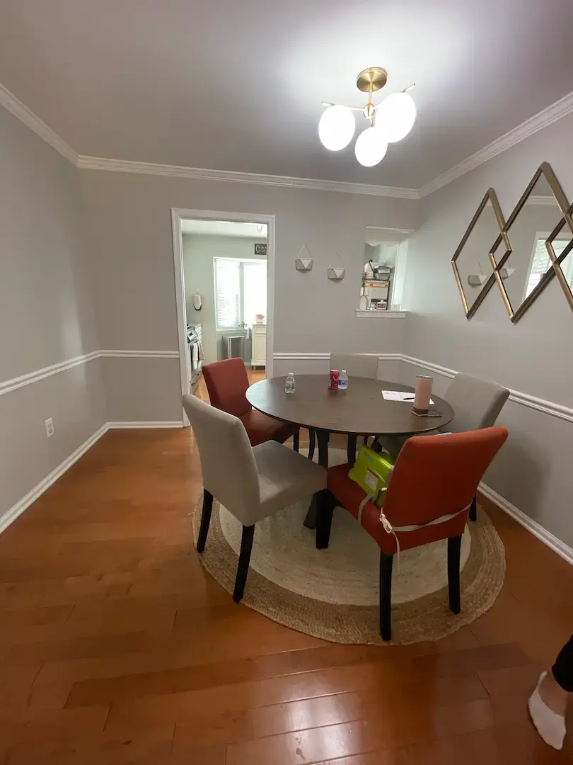 Dining room remodel adjacent to kitchen with modern lighting and open-concept design