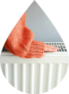 Hand op duurzame verwarming - Geniet van een behaaglijke sfeer met de verwarming aan