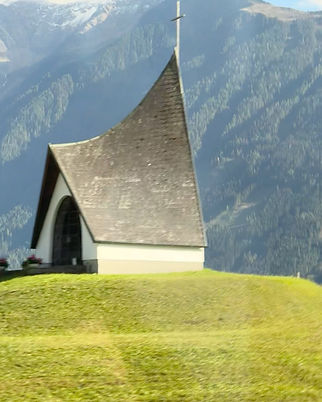 Tiny white Krebsbach Chapel in Tyrol, Austria
