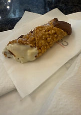Cannoli with a candied shell and chocolate and vanilla filling in Florence, Italy