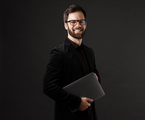 bearded-happy-man-in-jacket-smiling-while-posing-w-2023-11-27-05-16-17-utc (1)_edited.jpg