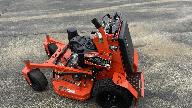 New orange 34-inch Bad Boy Revolt SD stand-on mower