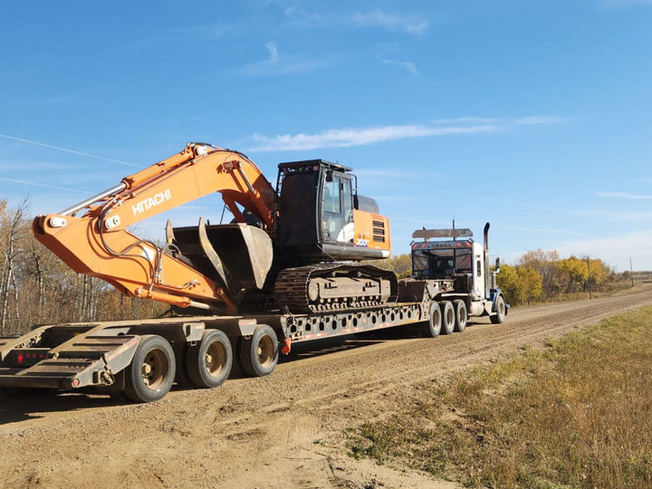 Excavator on site in Central Alberta