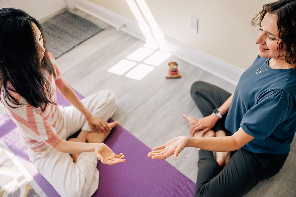 Kimberly Bevans (right) of Be Moved Therapy mirroring, or following along with the client’s movement, a technique used in dance/movement therapy. Kimberly is pictured with acting client, fellow dance/movement therapist and dancer Yu-Ling Hu.