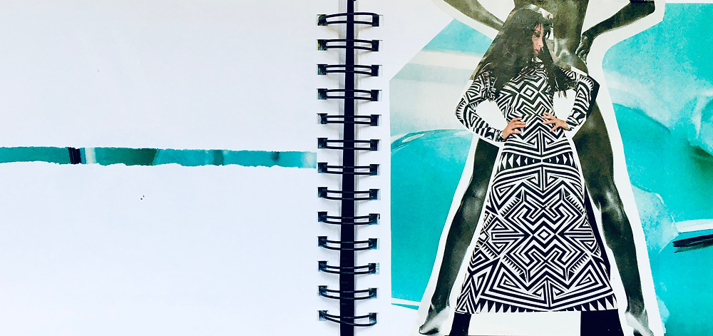 A photo of an art journal with an abstract line on one side and two women on the other.