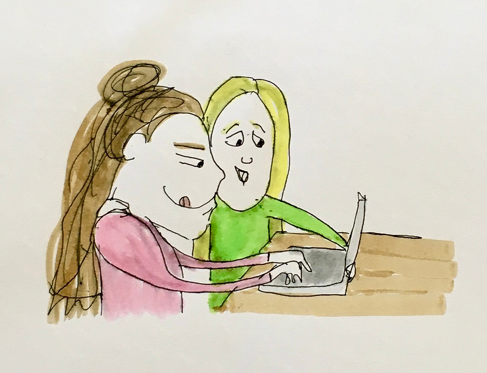 A person sits typing while another person is present to them. This is to illustrate Art Therapist Jackie Schuld's belief that encouragement is often needed in a writing practice.