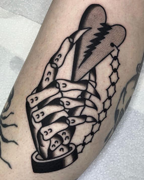 Blackwork traditional tattoo with bold lines and solid shading, tattooed in my private Amsterdam studio.