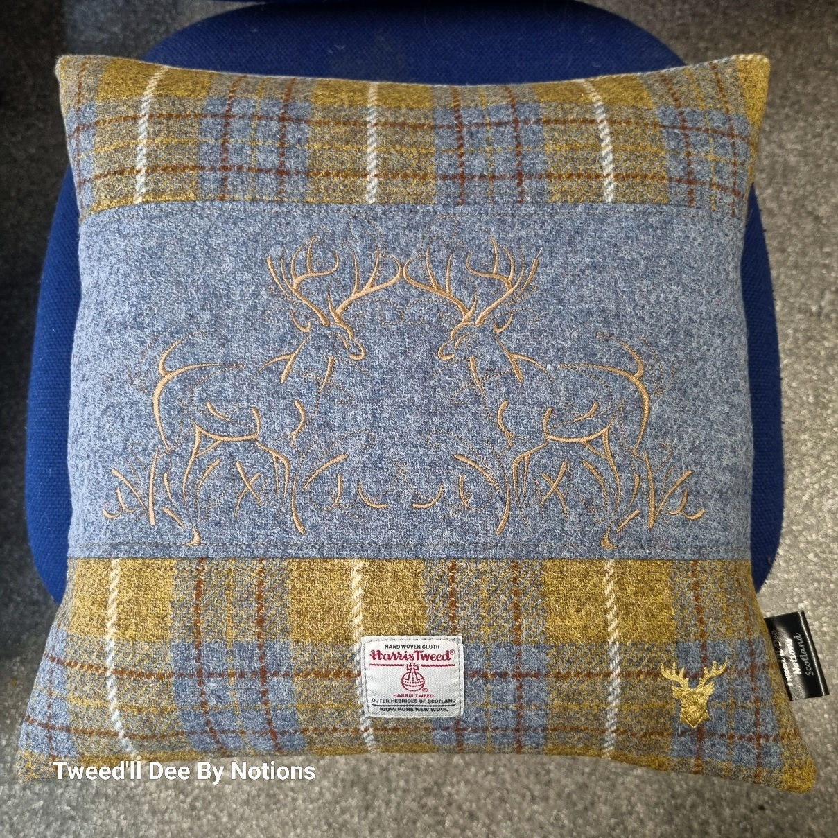 Gold check, pale blue panel, twin stags