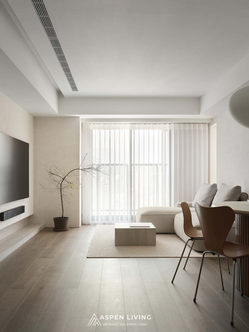 Thiết kế nội thất căn hộ chung cư 70m2 theo phong cách Soft Minimalism & Wabi-sabi phòng khách view cửa sổ