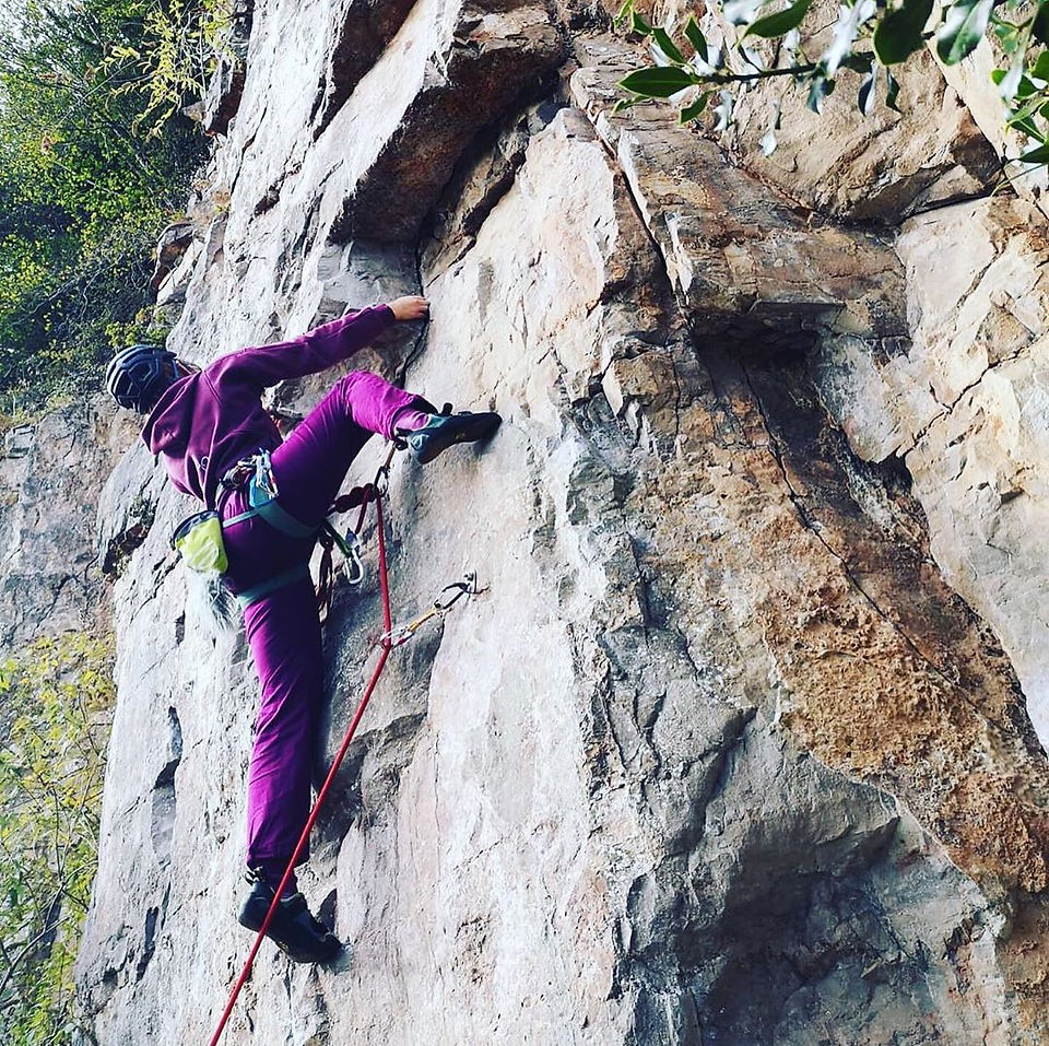 Woman climbing at Wyndcliff