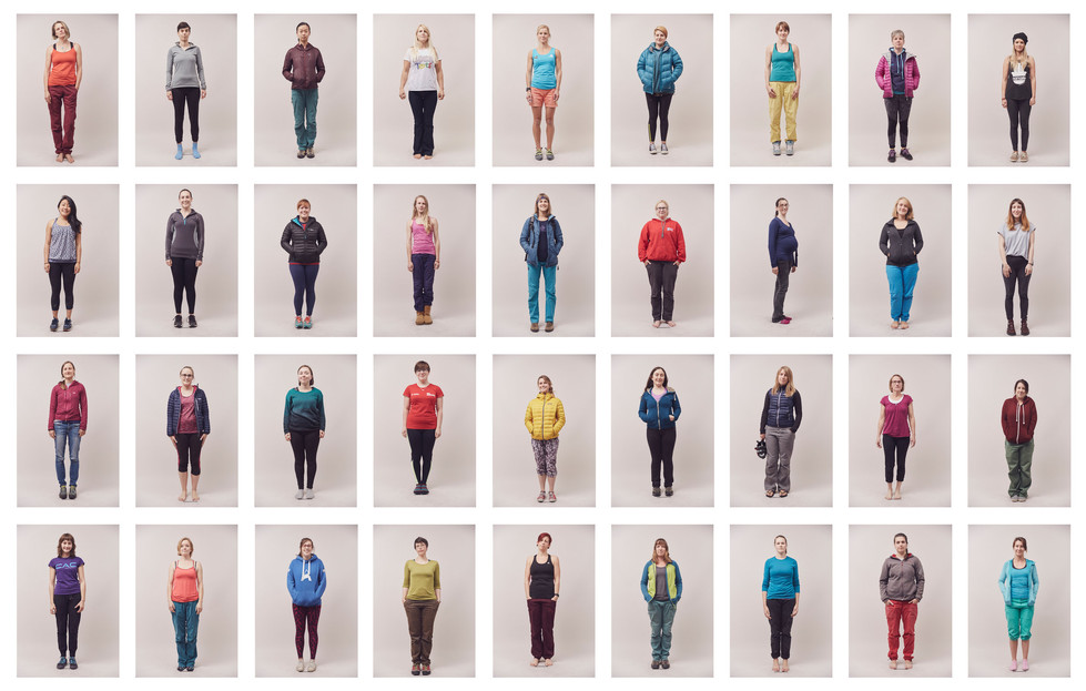 Women climbers standing for individual portraits; diverse bodies, old and young, taken at the Women's Climbing Symposium.