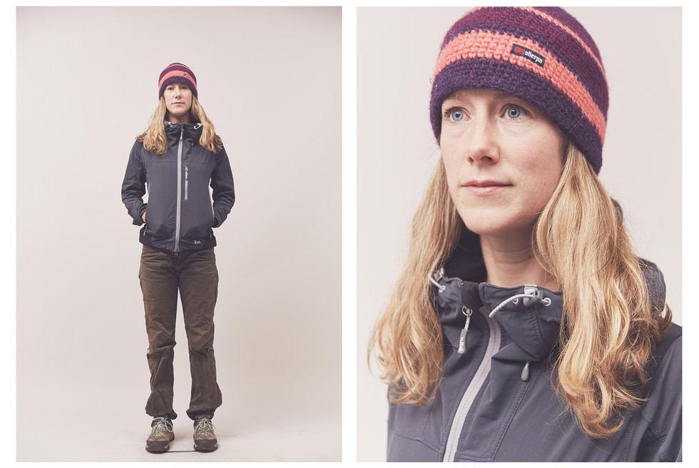 Portrait of a woman climber wearing a Sherpa beanie hat, taken at the Women's Climbing Symposium.