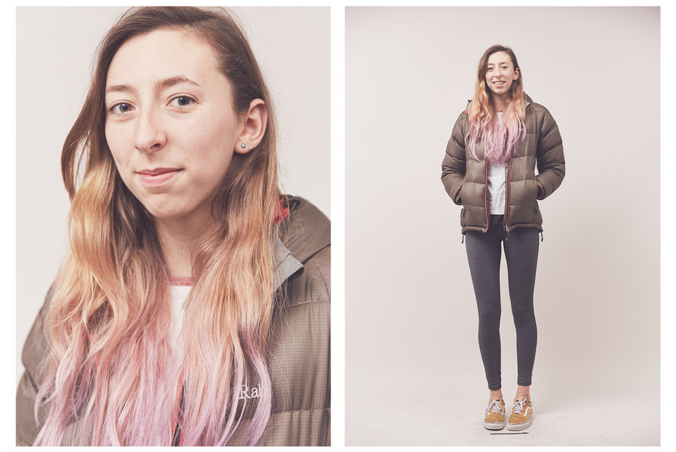 Portrait of a young woman climber with pink hair, taken at the Women's Climbing Symposium.