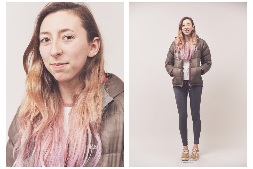 Portrait of a young woman climber with pink hair, taken at the Women's Climbing Symposium.