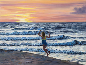 Little girl running on the beach