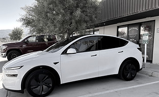 white tesla 2025 front omars tint shop_edited.jpg