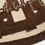 Thumbnail: The Coco Round Towel is designed for endless beach days, picnics with friends and lazing by the pool.  Close up of logo.