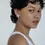 Thumbnail: Shashi Flower Pearl Earrings (Freshwater Pearl).  Shown on model.