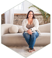 Female therapist in Brantford sitting on a couch for therapy and clinical supervision in Ontario.