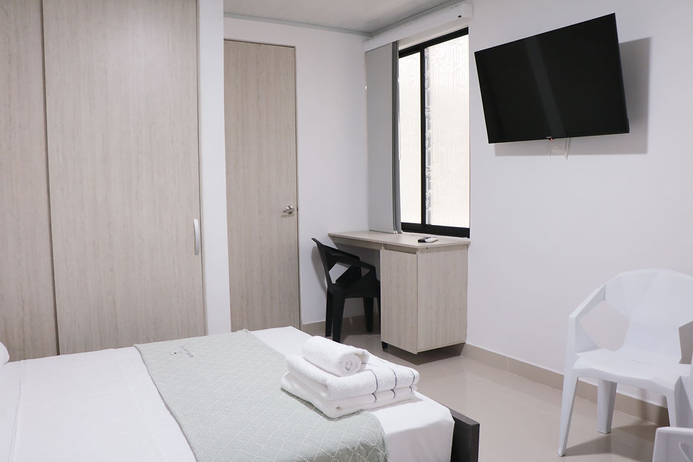 Habitación doble superior up con minibar y cama doble en Marventto Tumaco