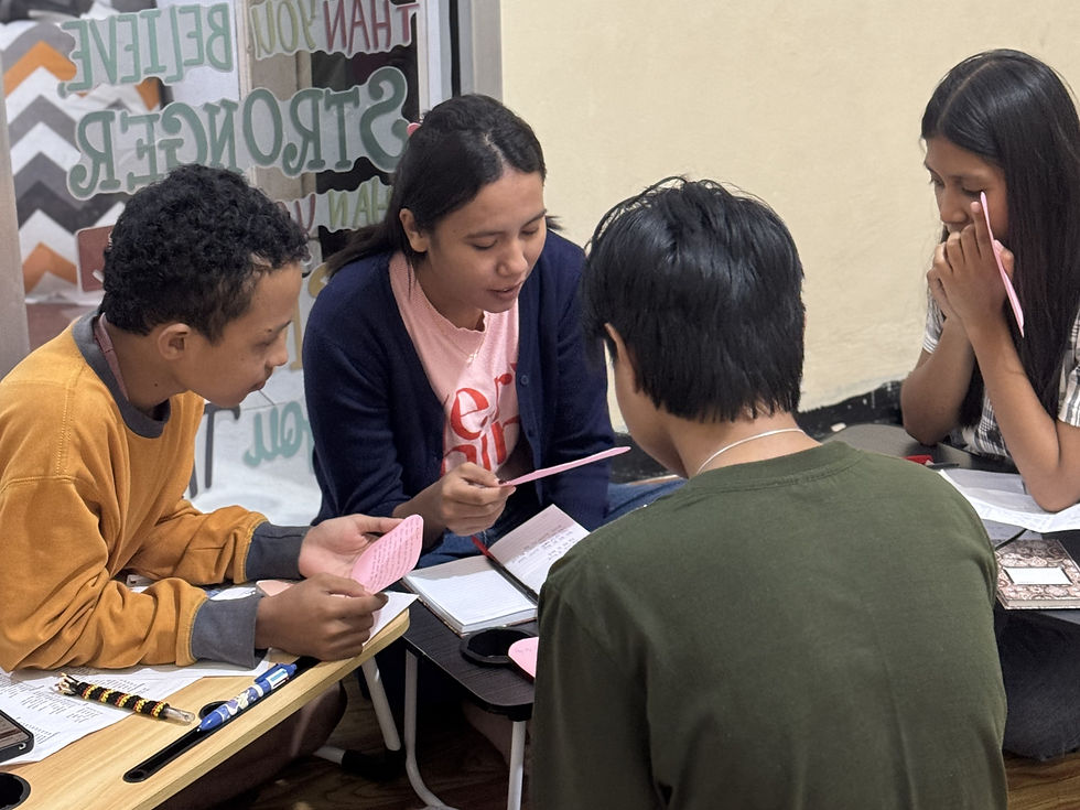 Close-up view of a student practicing English speaking skills