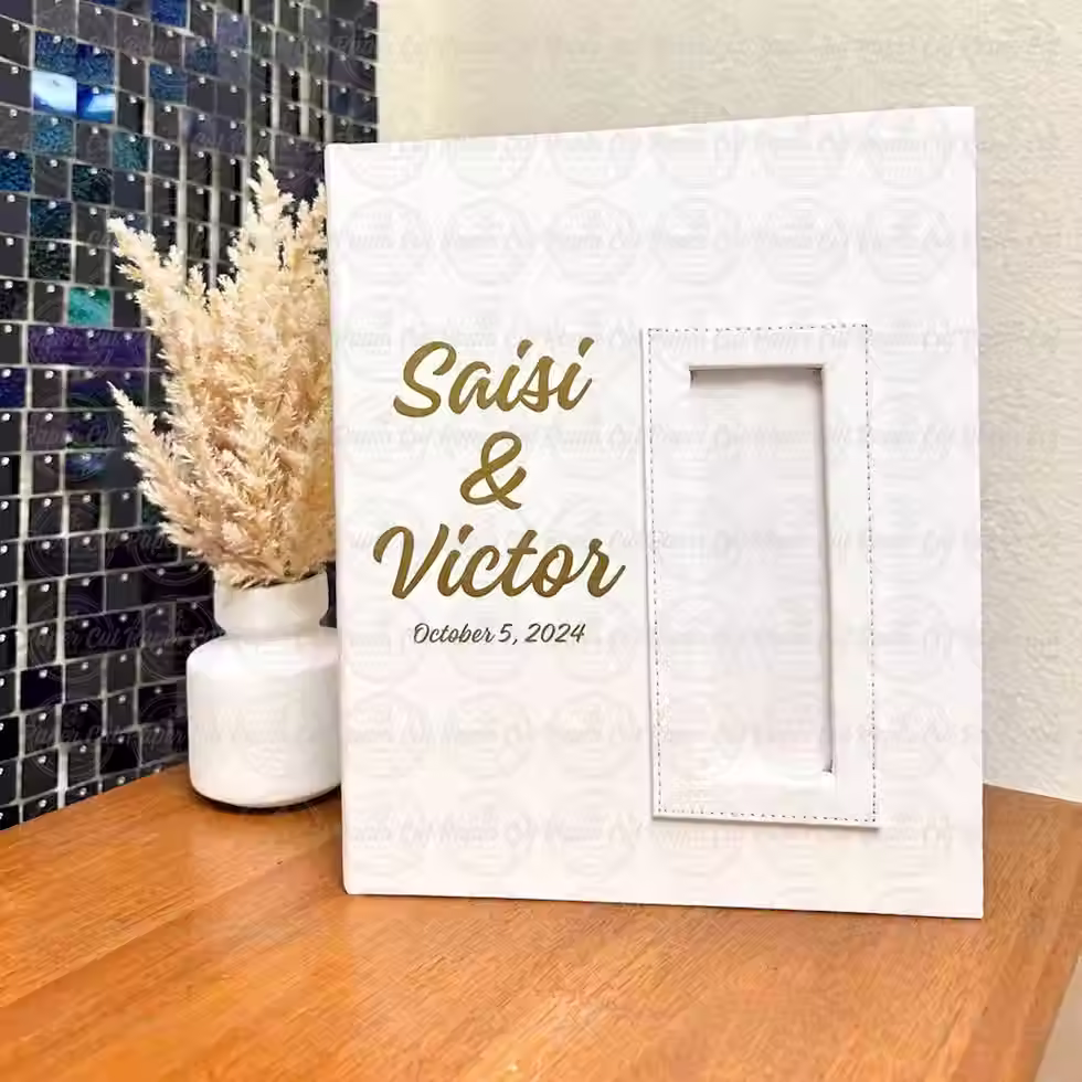 Close-up view of a beautifully engraved necklace with initials