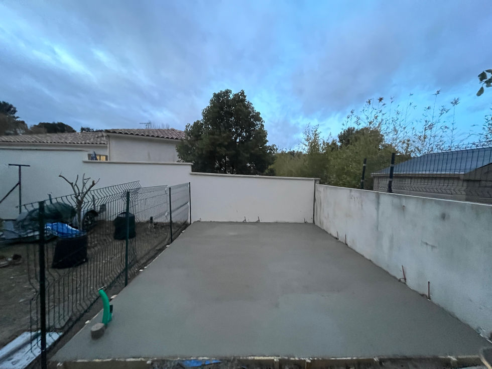 Dalle béton terminée avant montage de la structure bois
