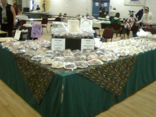 Two Tables full of baking. 