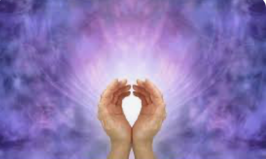 hands holding reiki energy