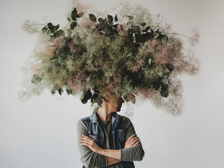 large-decorative-bouquet-made-green-leaves-moss-hangs-man-s-head.