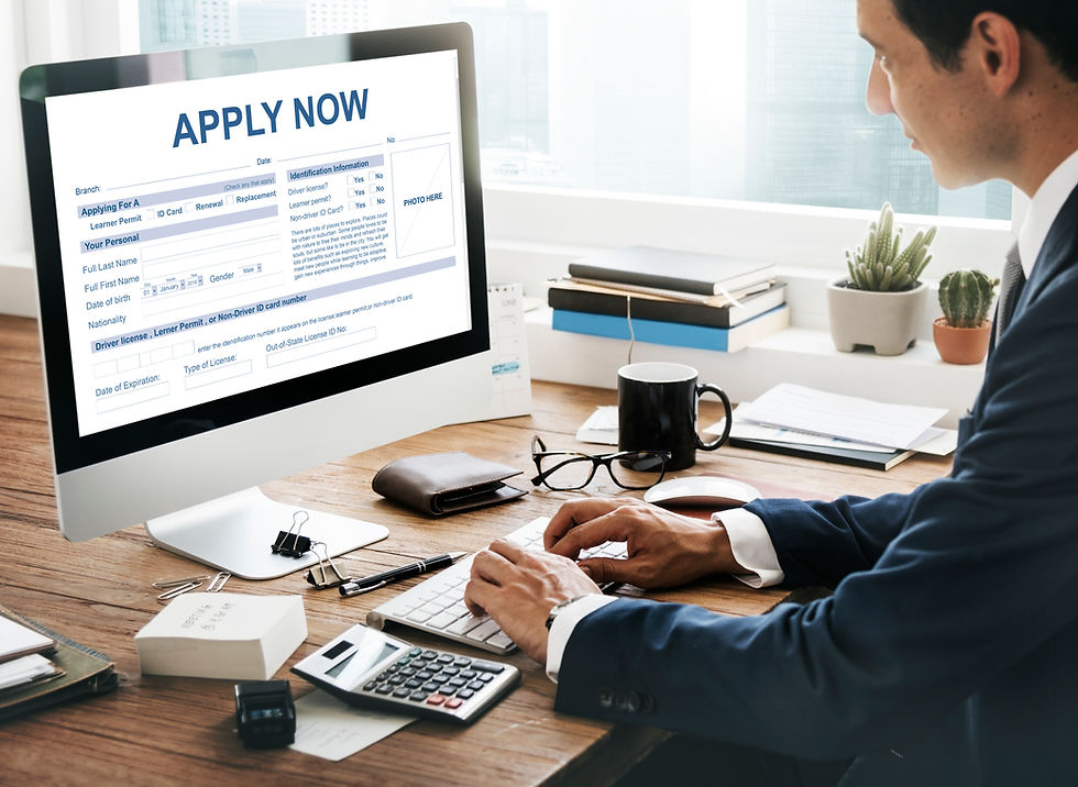 Student completing an online medical school application on a computer, representing the process of applying to international MD programs after exploring alternatives to local medical schools.
