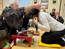 Sensei places Kyosei’s Rakusu