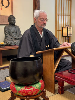 Sensei strikes the Bell