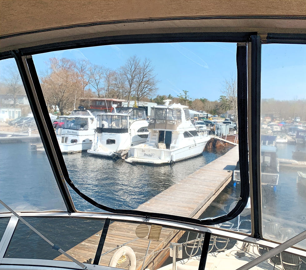Boats docked at a sunny marina, ready for Ship Shape Sewing Services