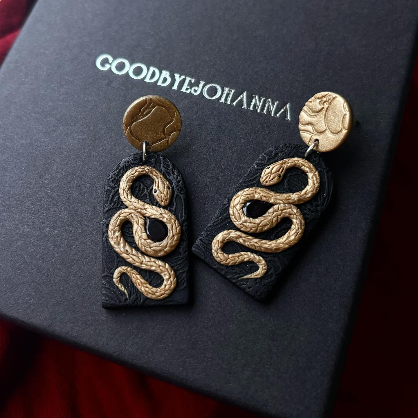 gold snake lace arch earrings 