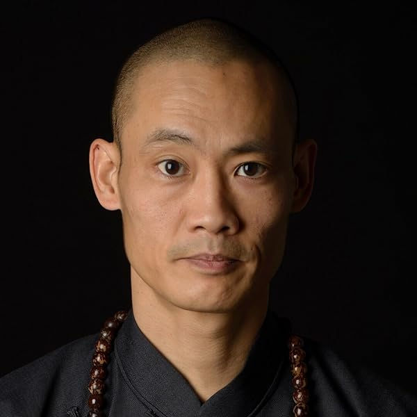 Portrait photo of the monk master Shi Heng Yi