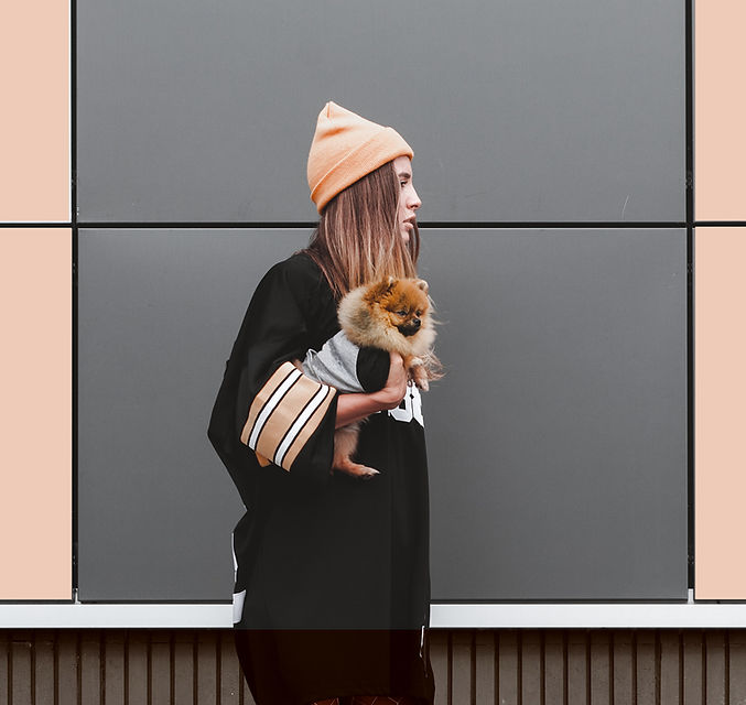 Woman with Pomeranian Puppy