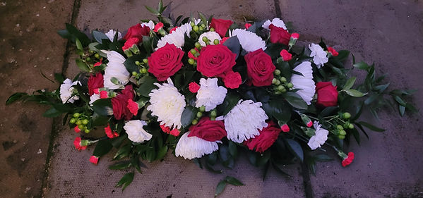 Red & White compact coffin spray
