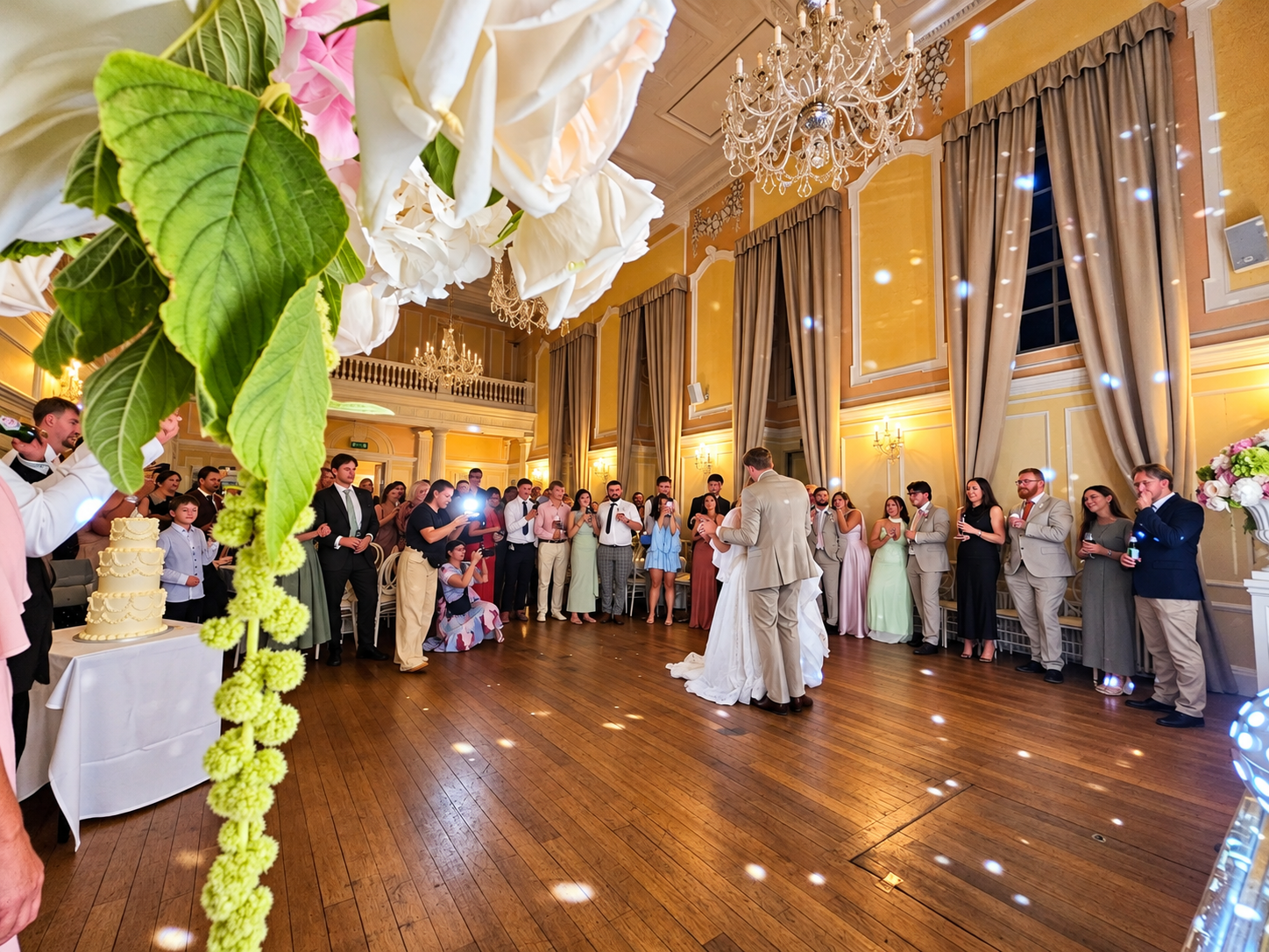 A couple sharing their first dance at an elegant Norfolk wedding celebration