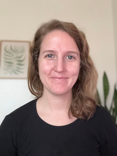 Picture of Mimi Bachman at desk.