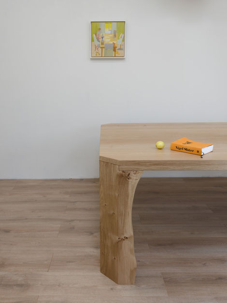a nigel slater book sits on a bespoke wooden table