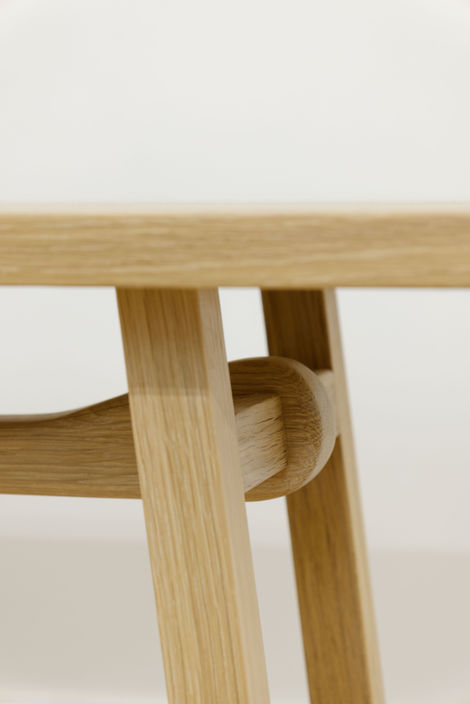 a close up of a wooden table with a white background