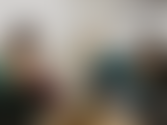 A therapist takes notes while talking to a distressed woman on a gray couch. Text reads "Understanding Complex Trauma: Healing Beyond PTSD."