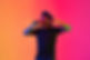young-african-american-musician-singing-gradient-orange-purple-studio-background-neon-ligh
