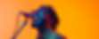 young-man-singing-into-microphone-photo.jpg