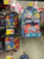 Blue action figure toy in store