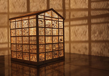 'Distillation of Experiences' Joey Richardson artist natural wood 128 panel filigree contemporary sculpture inspired by studio shed interior design
