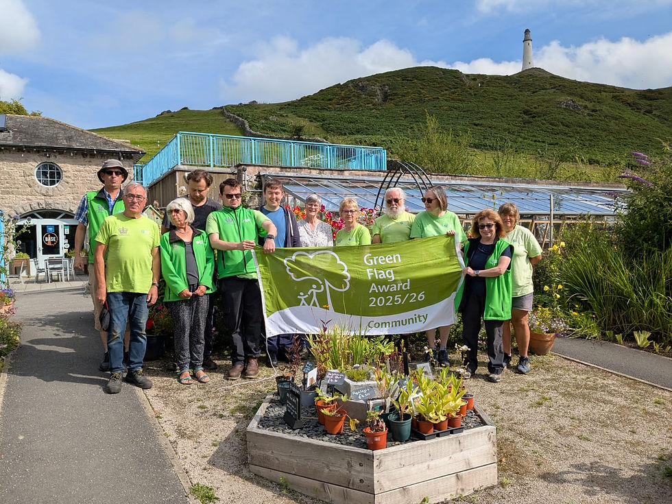 ford park volunteers with the green flag award